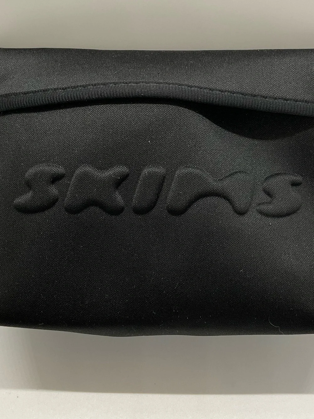 New SKIMS Black Neoprene Cosmetic Makeup Toiletry Pouch Bag